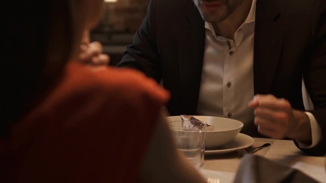Couple having dinner and fighting at the restaurant