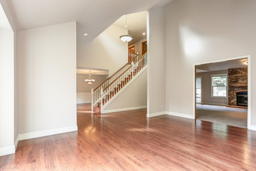 Empty entrance room with staircase.