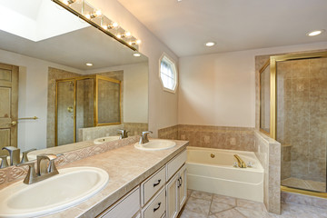 Master Bathroom with double vanity cabinet and shower.