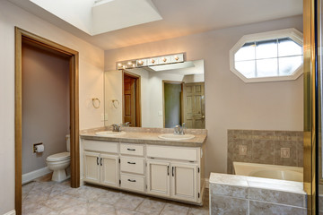 Master Bathroom with double vanity cabinet and shower.