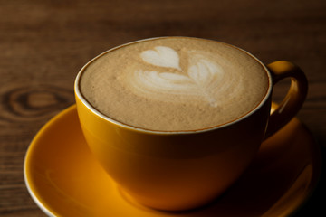 Cup of latte with heart. Close up