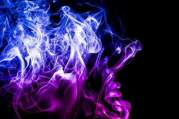 Colored smoke on black background