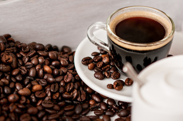 Coffee beans and a cup of espresso