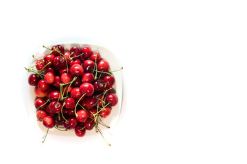 isolated cherry in the white plate