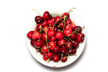 isolated cherry in the white plate