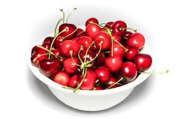 isolated cherry in the white plate