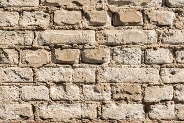 texture of the old wall of brick blocks, scattered brick and brickwork, architecture abstract background