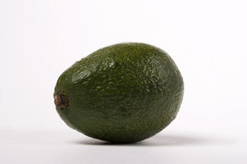 Green avakado on a white background.
