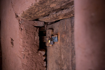 Modern and ancient locks at old door at world hertiage site Tichitt, Mauritania