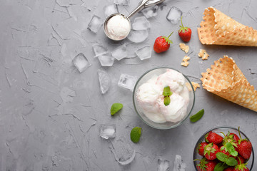 Strawberry ice cream with waffle cone, and strawberries and a spoon for ice cream. With empty space for writing