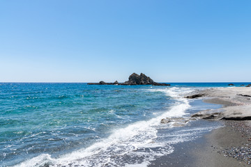 Lybian Sea compressed rock layers island cut off mainland of south central Mediterranean coast of Crete, Greece. Nature and Geological science concept