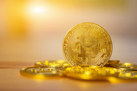 cryptocurrency,Bitcoin Gold (BTG) on gold background with copy space - as the result of latest Bitcoin's digital money