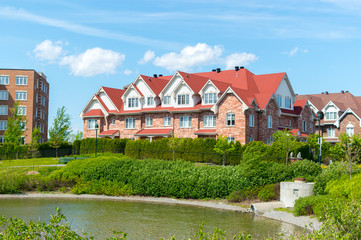 Luxury house in Montreal, Canada against blue sky