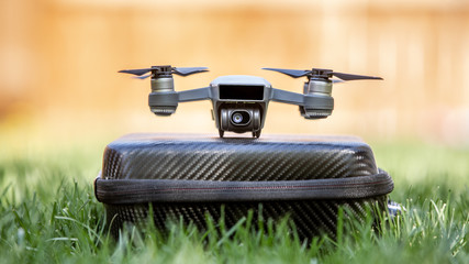 Small Drone on Case in Grass, Centered
