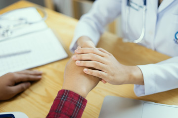 Women Doctors and patient are discussing something ,Having Consultation,Medical Pretty Doctor working in hospital writing a prescription, Healthcare and medically concept,selective focus
