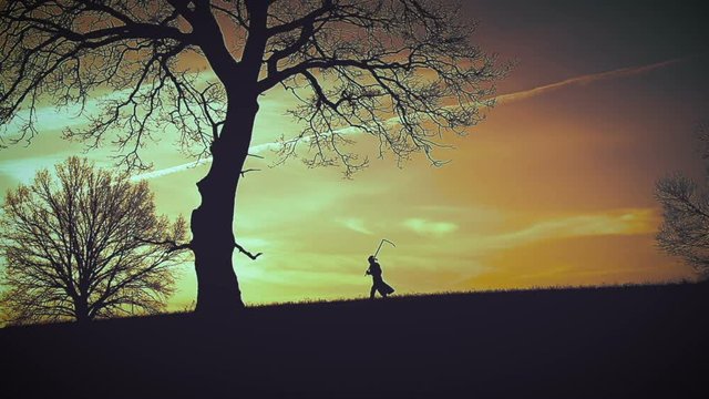 At sunset there is a grim Reaper