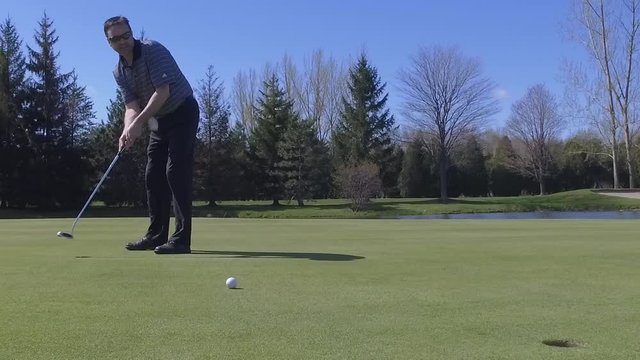 golfer reacts to missed putt slow motion