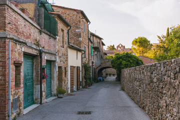 Fototapeta na wymiar urban view of empty street in Tuscany, Italy