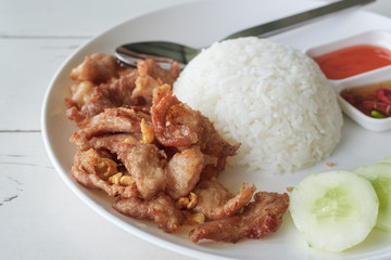 fried pork with garlic topping with jasmine rice, simple menu thai food