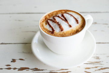 Hot coffee or cappuccino in white cup