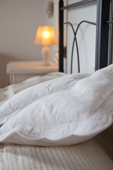 pillows on bed - bright bedroom interior design