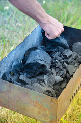 delicious and juicy kebab cooked on fire. fire in barbecue grill