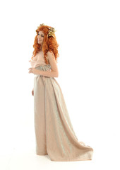 full length portrait of pretty red haired lady wearing fantasy toga gown, standing pose on white...