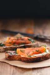 Foto auf Acrylglas Antireflex Smoked salmon sandwich appetizer with toasted bread © Phish Photography