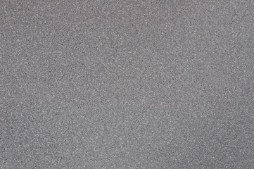 Background of gray granite with spotted texture.