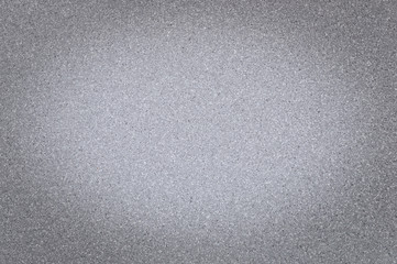 Texture of granite gray color with small dots, with vignetting, use background.