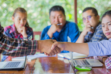 Business people shaking hands,Business Collaboration Concepts,  finishing up a meeting,