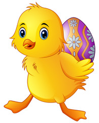 Cute little duck carrying a decorated egg