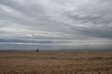Fototapeta na wymiar Scottish Cloudy Beach