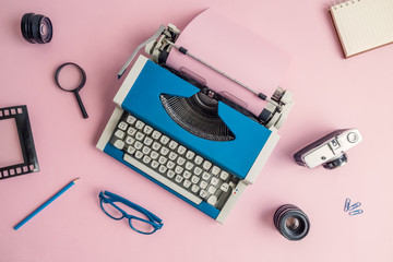 Flat lay of retro blogger equipment background.