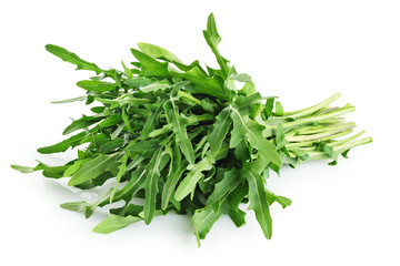 Fresh rucola leaves isolated on white background.