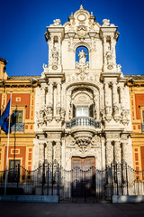 Fototapeta premium Spain, Seville, LOW ANGLE VIEW OF historical university college BUILDING AGAINST SKY