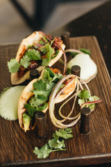 Delicious tacos with vegetables and parsley, Mexican cuisine