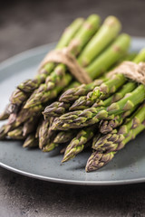 Close-up Bunch of fresh asparagus on plate