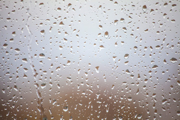 Rain drops on the window glass