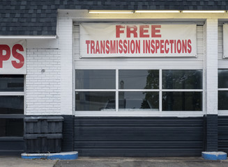 Auto repair shop bays shade tree mechanic deals transmission inspection