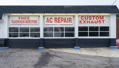 Auto repair shop bays shade tree mechanic deals transmission air conditioning exhaust