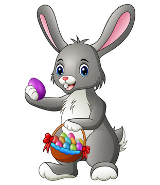 Cute Cartoon Rabbit Holding a Basket with Eggs