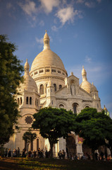 Fototapeta na wymiar The Famous Sacre Coeur Basilica Overhanging Paris from the Mound Montmartre