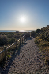 The beach of the dead with the sun and the blue sky
