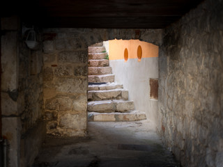 Passageway and stairs of an old house in Cres