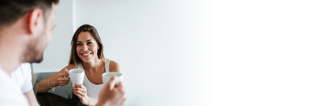 Close-up Image Of Couple Drinking Cup Of Coffee Or Tea.