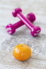 Dumbbels and tangerines