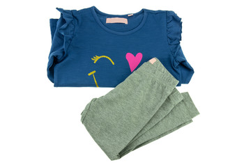 Childrens blue sweater with long sleeves and grey leggings for girl folded and isolated on white.