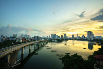 Fototapeta premium Aerial skyline view of Hanoi. Hanoi cityscape at twilight at Hoang Cau lake
