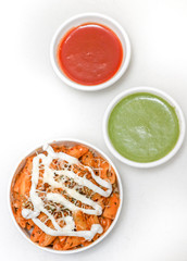 Pasta with red and green sauce 